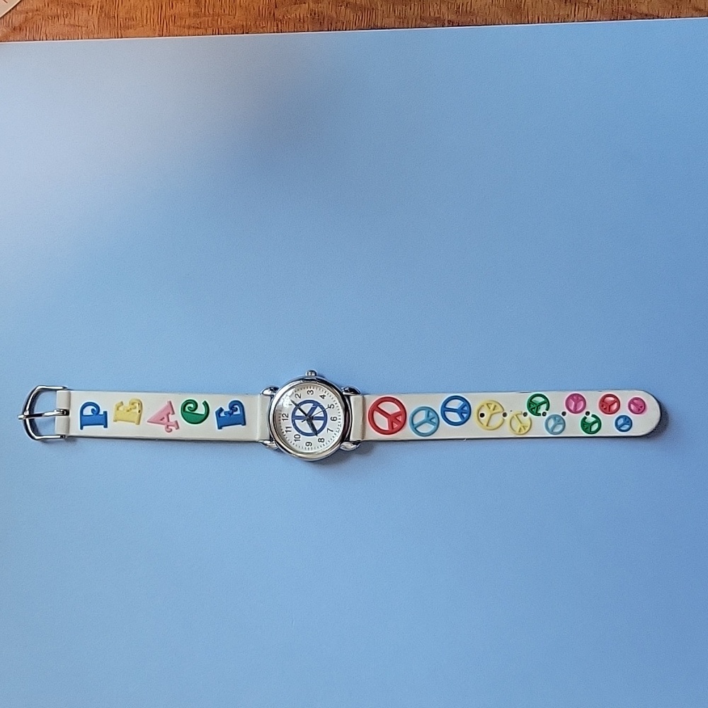 Geneva Peace Sign Watch Multi Colored with White Silicone Strap. New Battery